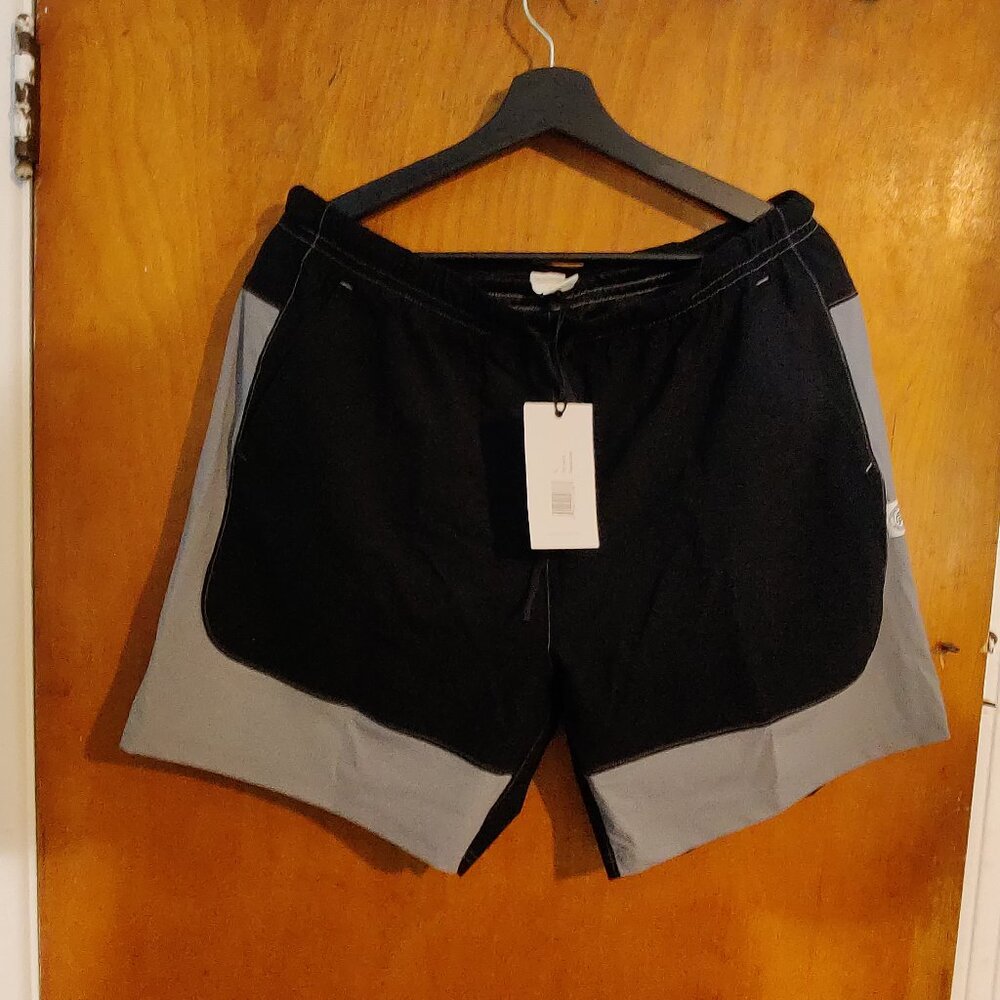Reigning Champ High Gauge Swim Short 6". Brand new. L